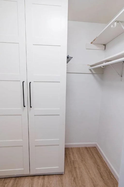 2600 Penny Lane, Unit 112 Austin, TX 78757 - Photo 17 of 20 a view of walk in closet with empty racks