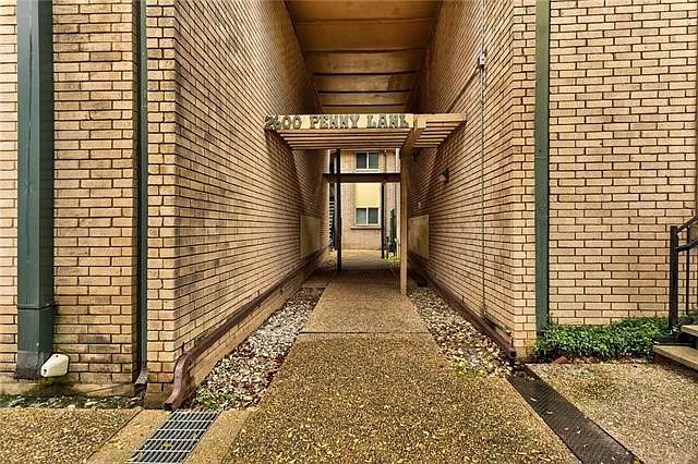2600 Penny Lane, Unit 112 Austin, TX 78757 - Photo 20 of 20 a view of a pathway both side of building