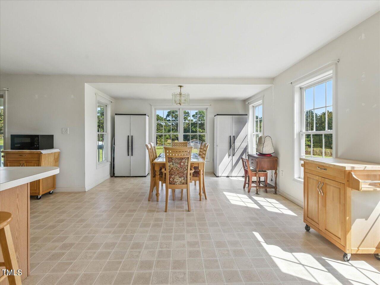 2892 Silk Hope Liberty Road Siler City, NC 27344 - Photo 13 of 74 a view of a livingroom with furniture and a window