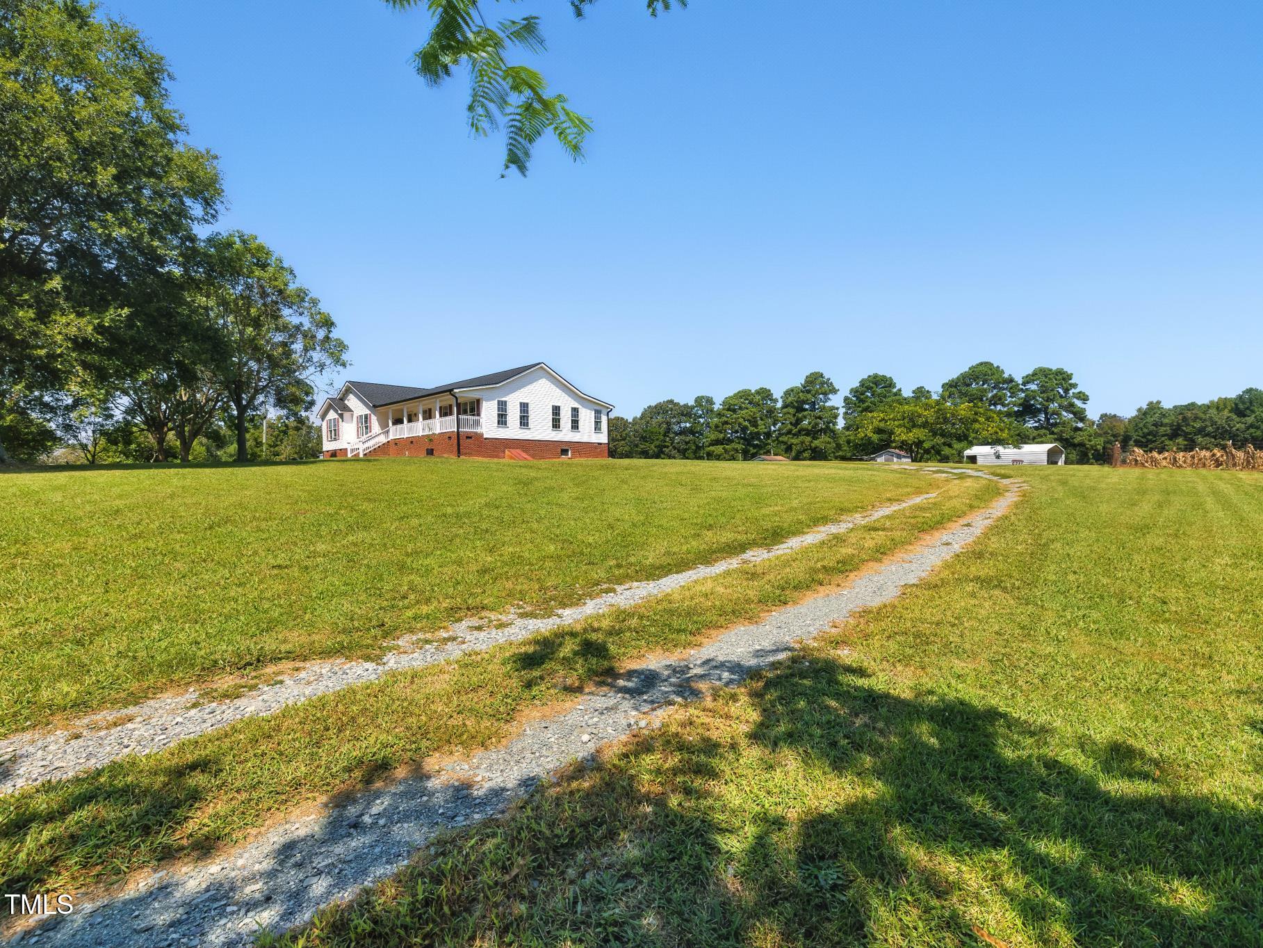 2892 Silk Hope Liberty Road Siler City, NC 27344 - Photo 57 of 74 a view of an ocean and a yard