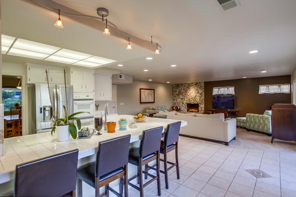 2322 Windmill View Road El Cajon, CA 92020 - Photo 14 of 25 Kitchen open up to large great room! Plus breakfast bar that can sit up to 10 family members or guests!