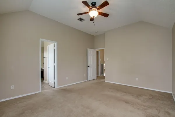 a bathroom with a bathtub a shower and a vanity