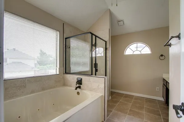 a bathroom with a sink a vanity and a mirror