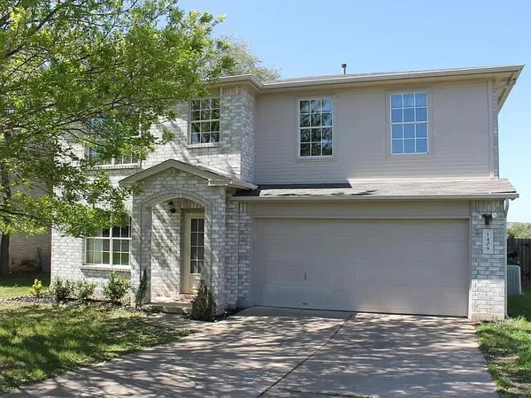 a front view of house with yard