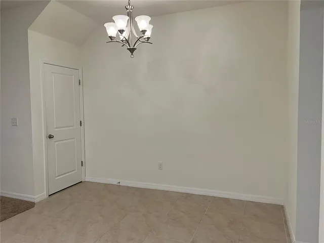 an empty room with sliding door