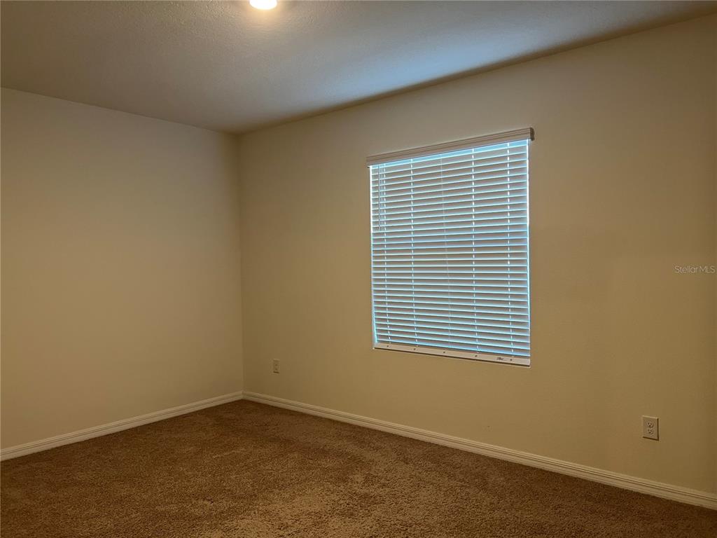 3816 Vignoble Lane Brandon, FL 33511 - Photo 17 of 21 an empty room with a window