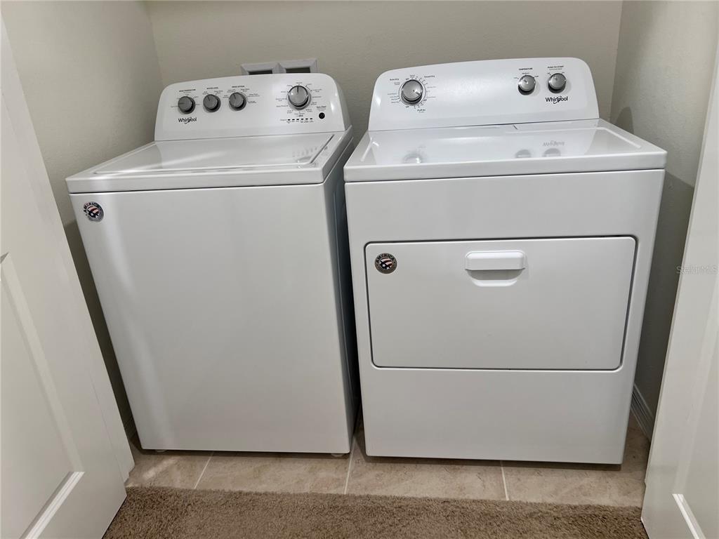 3816 Vignoble Lane Brandon, FL 33511 - Photo 19 of 21 a utility room with dryer and washer