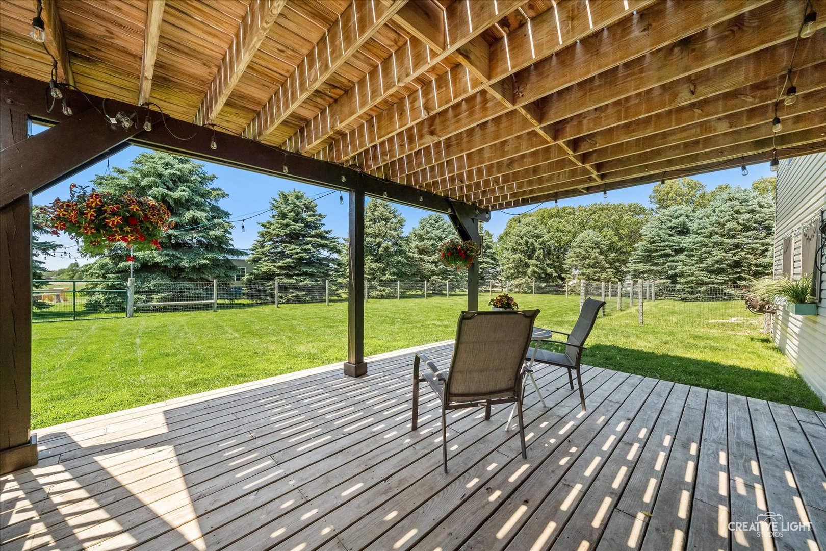 13495 Fennel Road Newark, IL 60541 - Photo 36 of 43 a view of a wooden deck with a yard