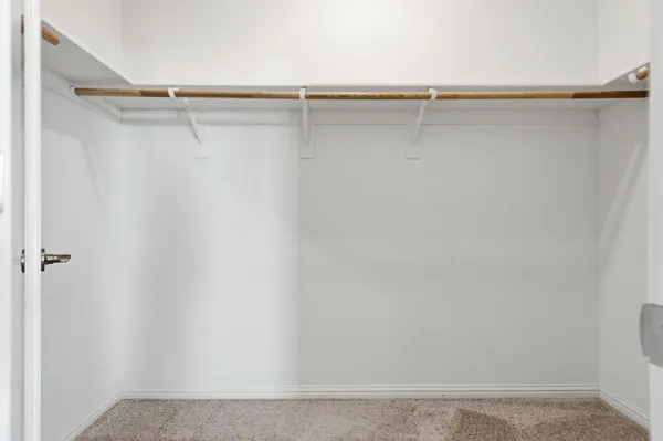 a view of a room with racks on the wall