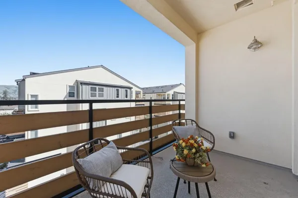 a view of a chairs in a balcony