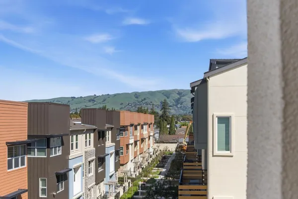 a view of a houses with city view