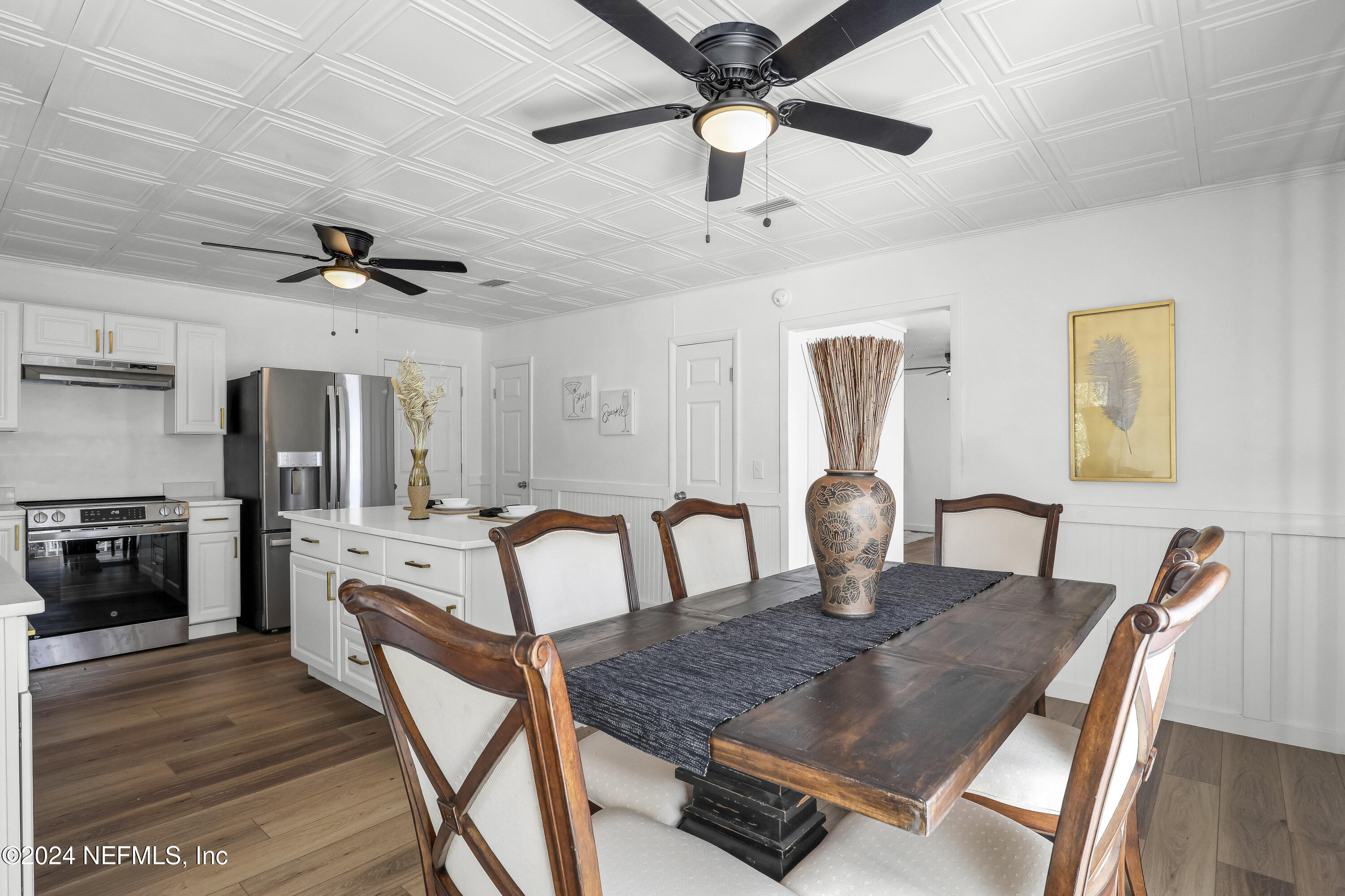 54221 Cravey Road Callahan, FL 32011 - Photo 23 of 52 a dining room with furniture and window