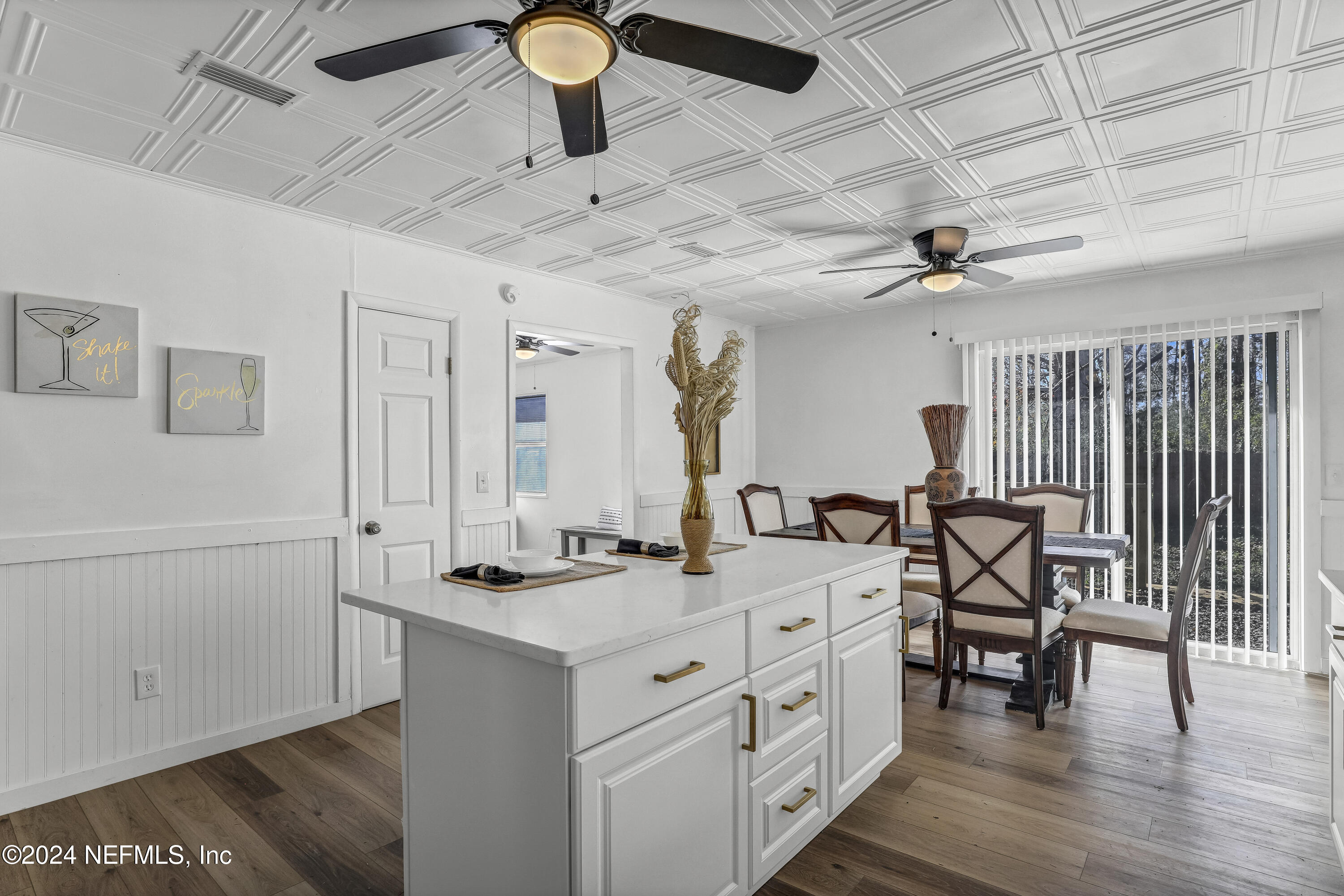54221 Cravey Road Callahan, FL 32011 - Photo 25 of 52 a kitchen with a sink appliances and cabinets
