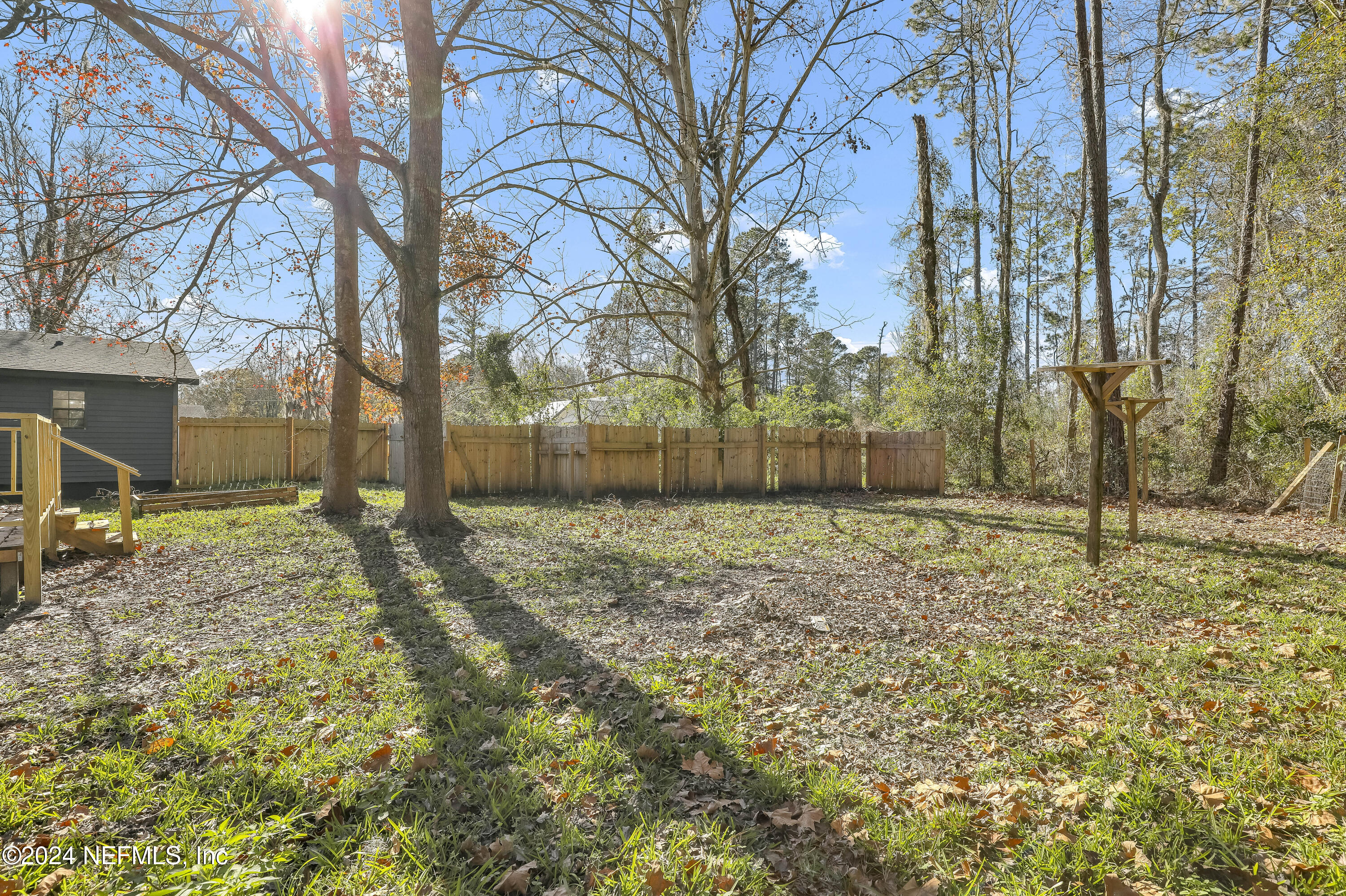 54221 Cravey Road Callahan, FL 32011 - Photo 49 of 52 a view of a backyard with large trees