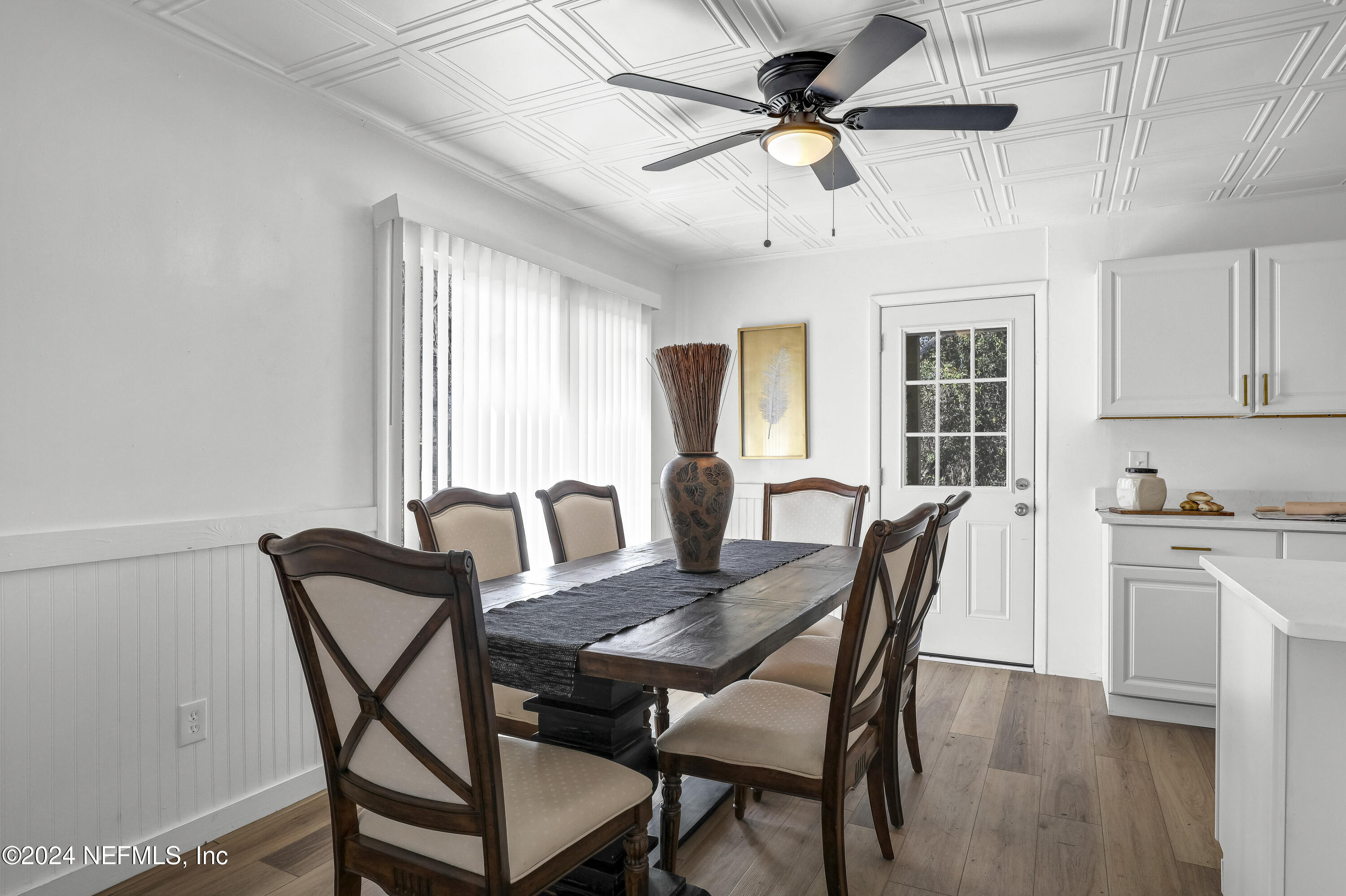 54221 Cravey Road Callahan, FL 32011 - Photo 5 of 52 a view of a dining room with furniture window and wooden floor