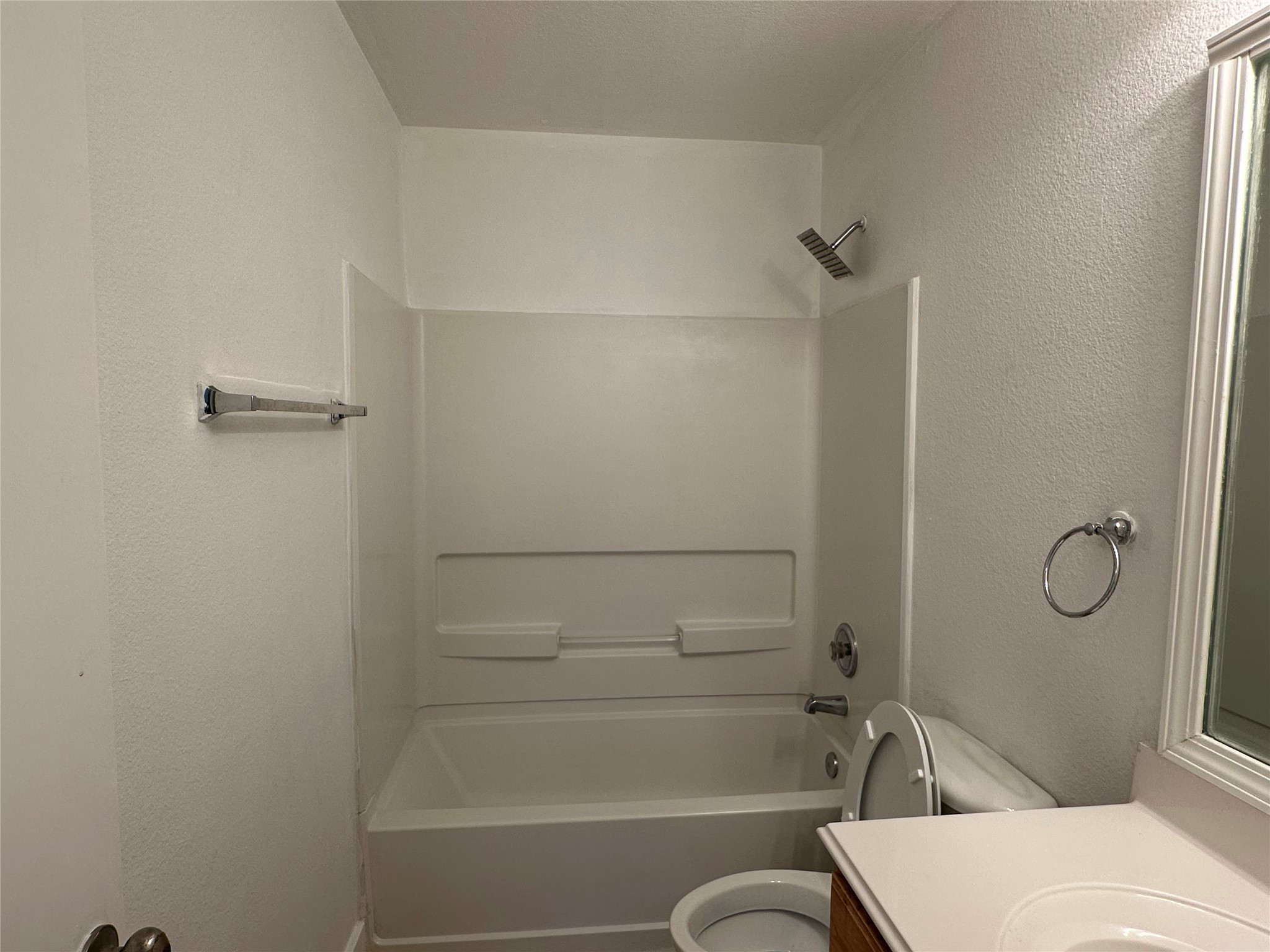 7430 Rabbit Ridge Missouri City, TX 77459 - Photo 17 of 17 a bathroom with a shower a toilet and a shower