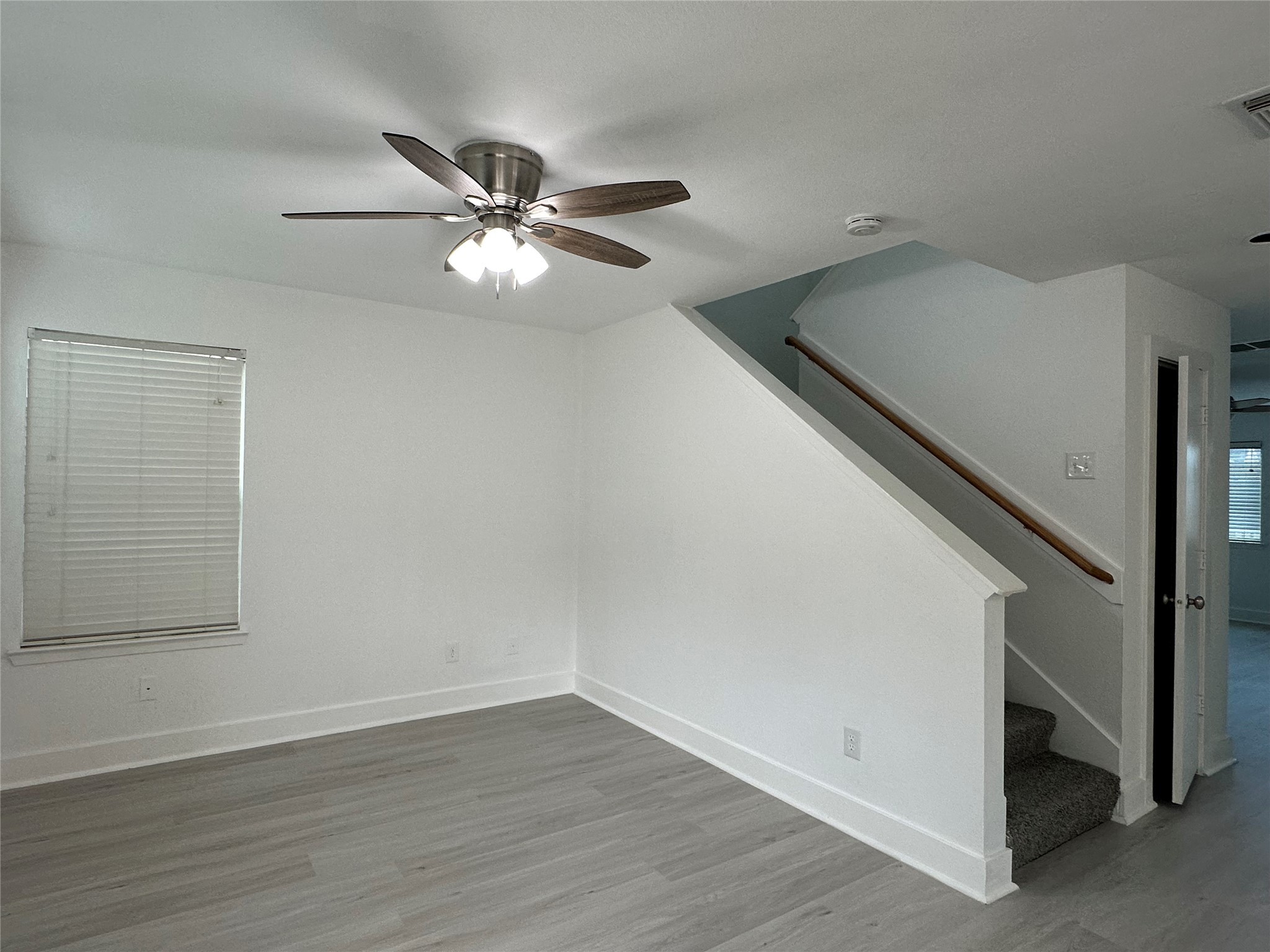 7430 Rabbit Ridge Missouri City, TX 77459 - Photo 3 of 17 a view of empty room with wooden floor