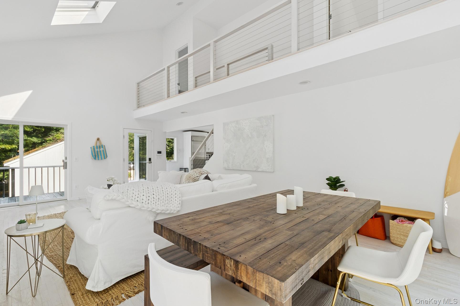 28 Ridge Road Wainscott, NY 11937 - Photo 24 of 40 a dining room with table and chairs