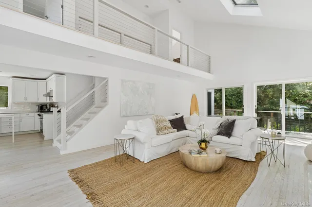 a living room with furniture or couch and a table