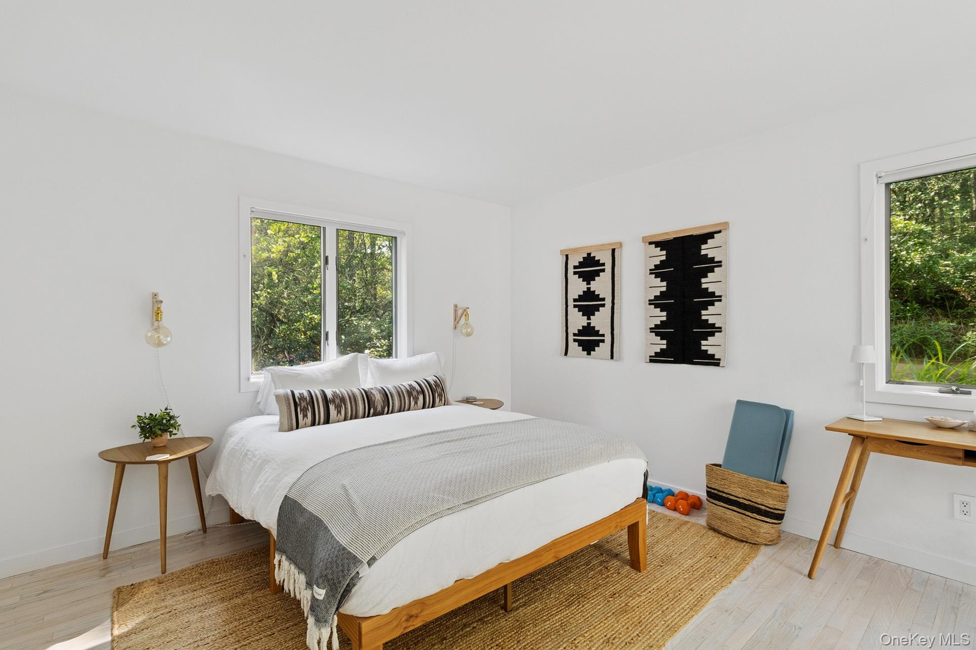 28 Ridge Road Wainscott, NY 11937 - Photo 32 of 40 a bedroom with a bed and a window