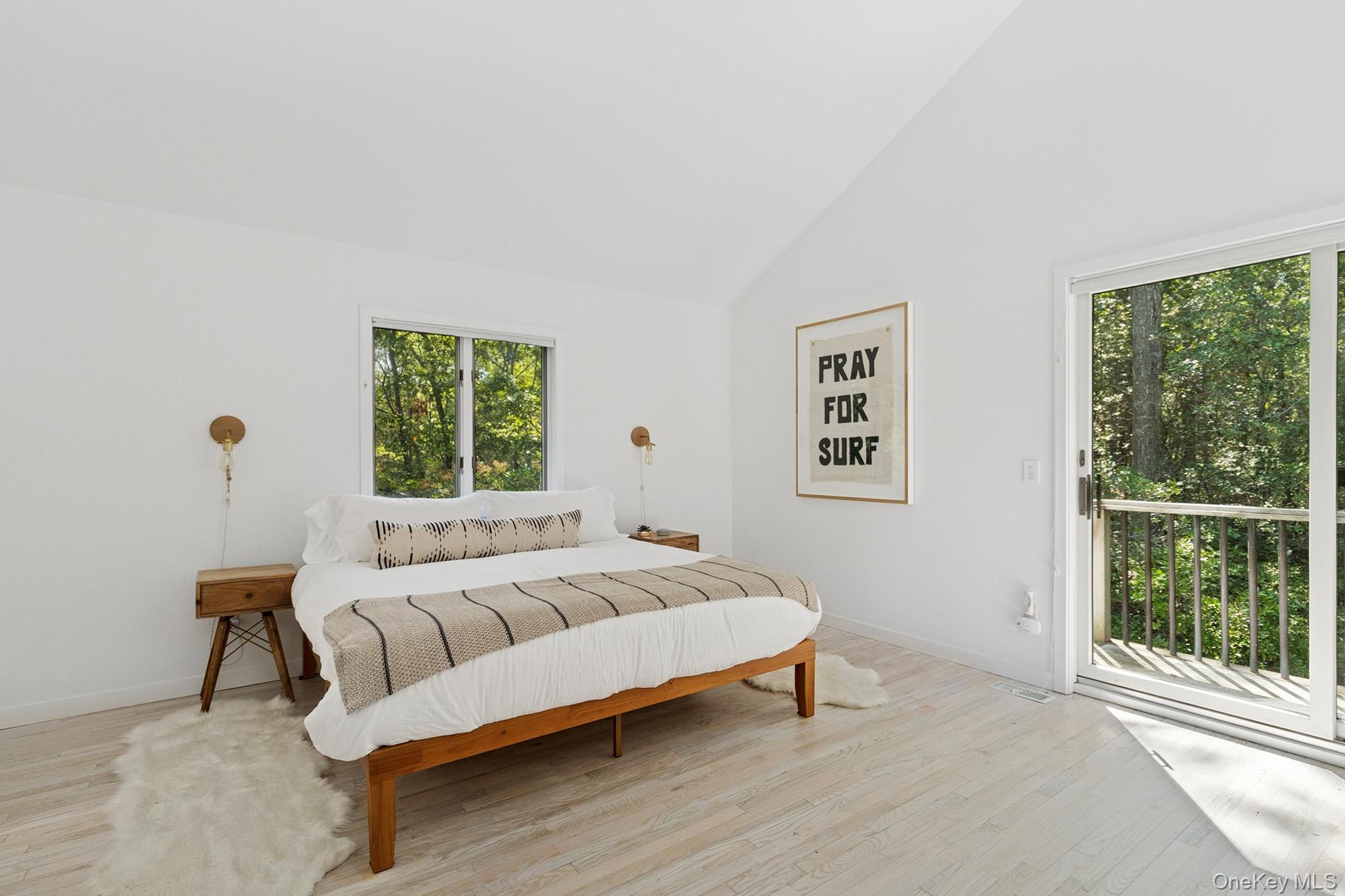 28 Ridge Road Wainscott, NY 11937 - Photo 33 of 40 a bedroom with a bed and a window
