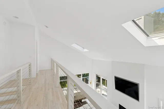 a front view of a house with a yard and outdoor seating