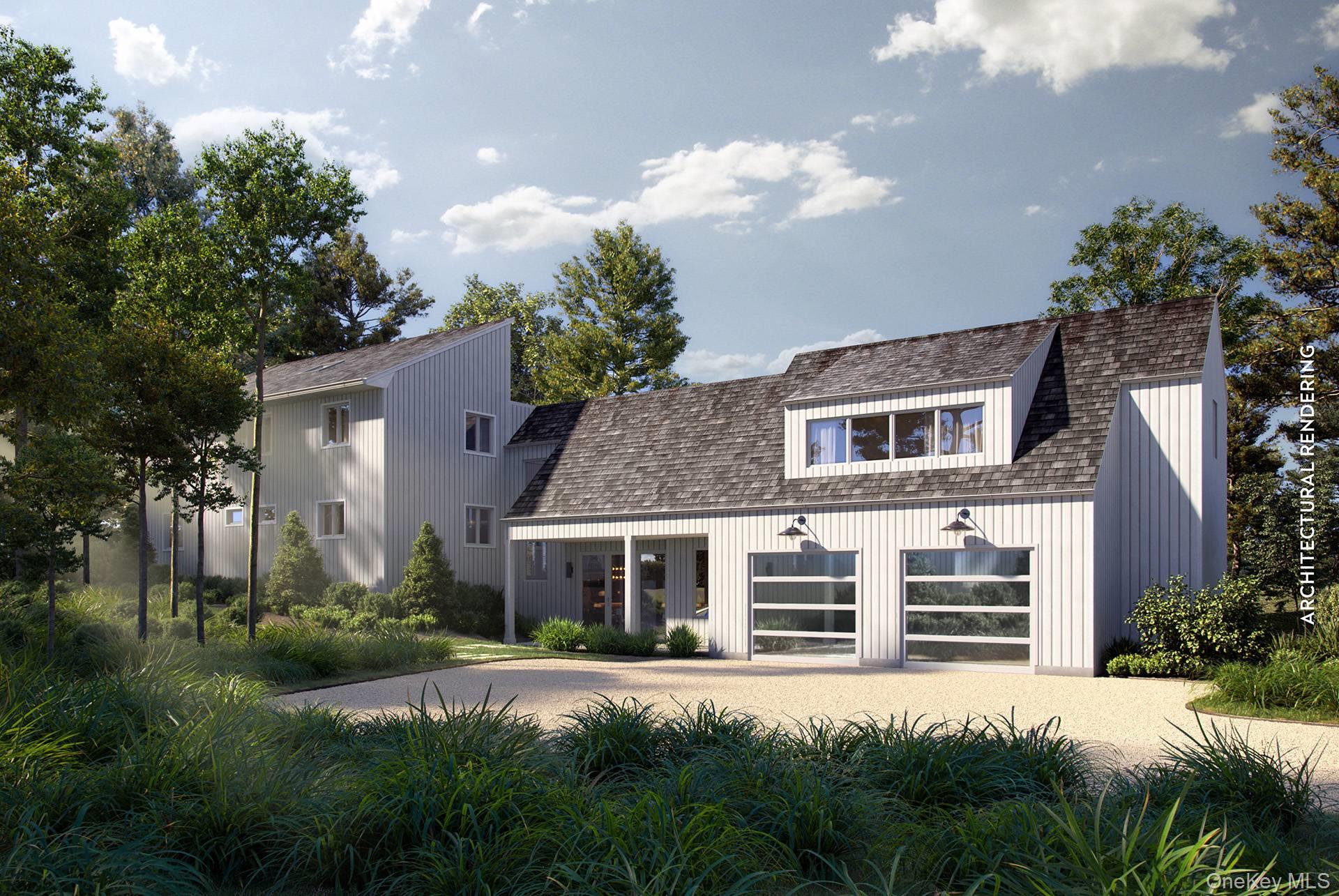 28 Ridge Road Wainscott, NY 11937 - Photo 38 of 40 a front view of a house with a yard and outdoor seating