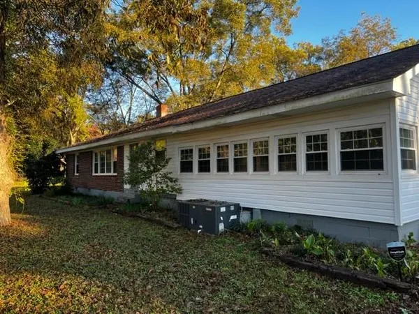 a house that has a lot of plants in it