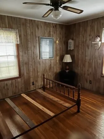 a view of a livingroom with furniture and chandelier