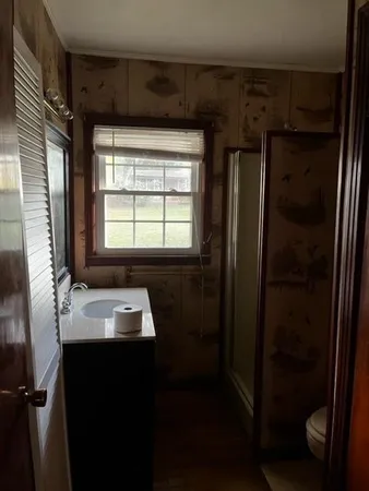 a room with a window and storage