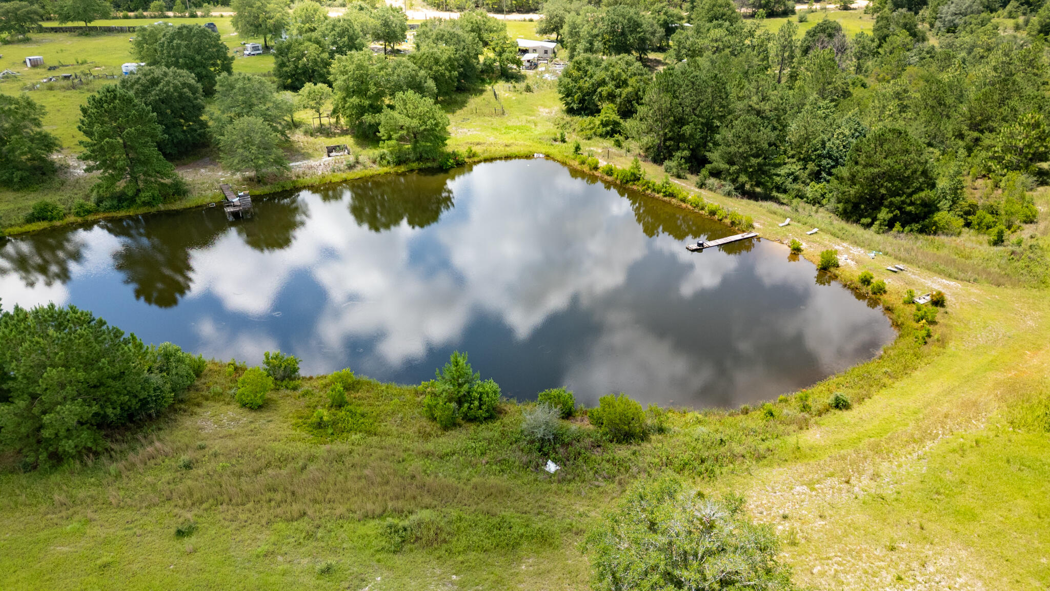 Xx Hinote Road DeFuniak Springs, FL 32433 - Photo 6 of 9 a view of a lake with a yard
