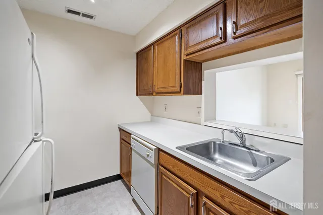 a kitchen with a stove and a microwave