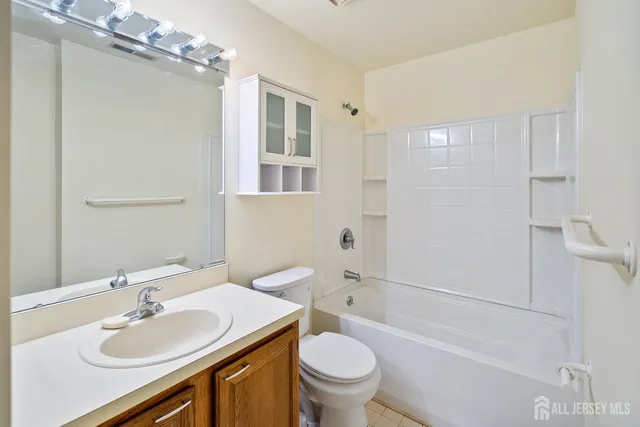 a bathroom with a toilet and a sink