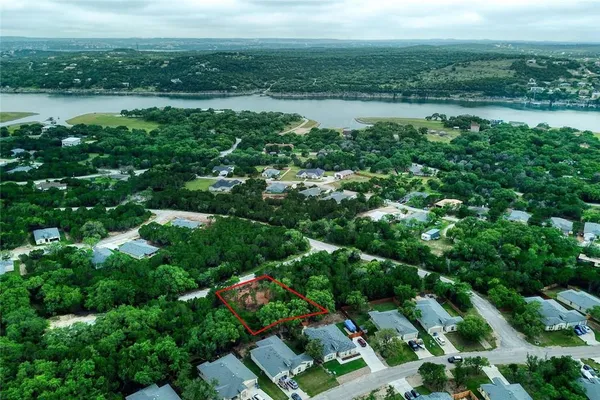 a view of a lake with a city