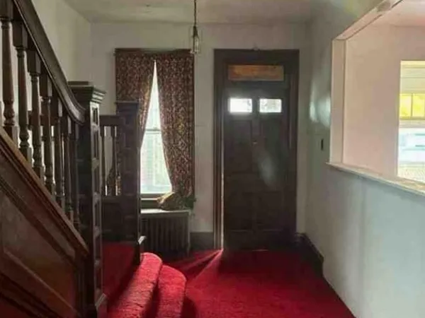 a view of hallway with stairs