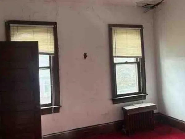 a view of an entryway with a window