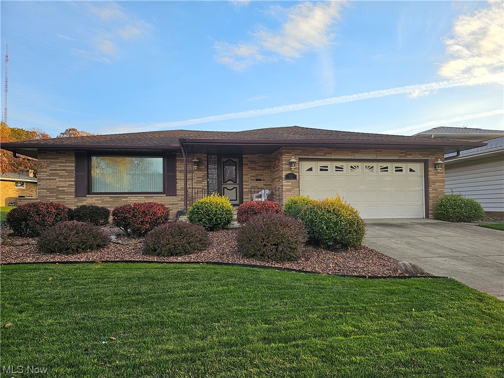 All brick ranch with attached 2 car garage
