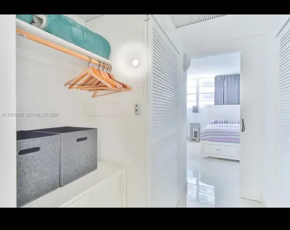 a bathroom with a tub sink and shower