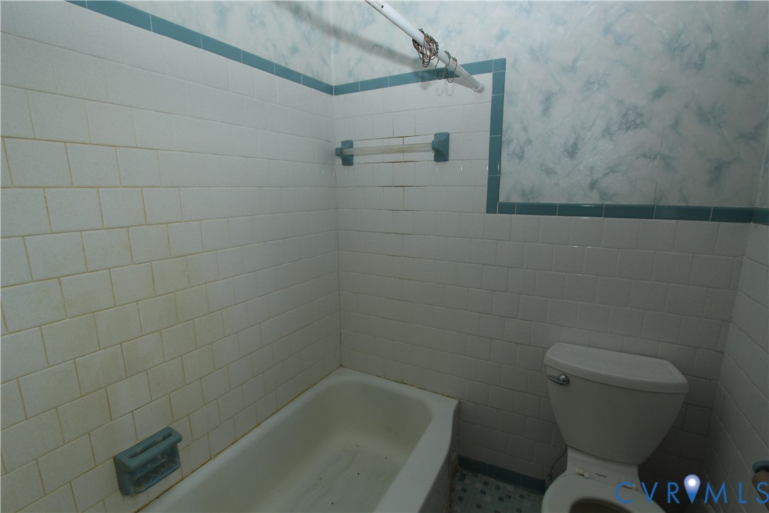 17037 Beaver Dam Road Beaverdam, VA 23015 - Photo 11 of 27 a bathroom with a toilet and a shower