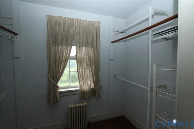 a view of entryway with a small yard