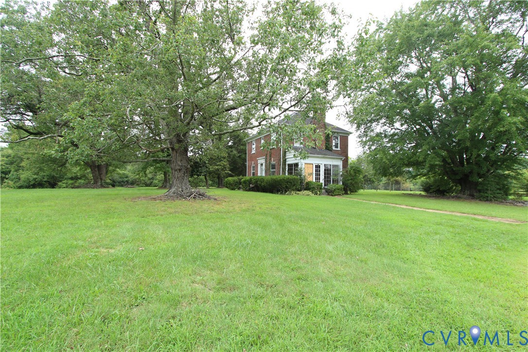 17037 Beaver Dam Road Beaverdam, VA 23015 - Photo 17 of 27 a front view of house with yard and green space