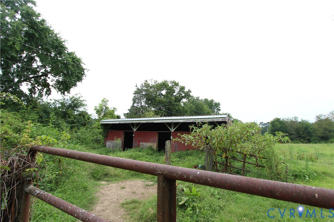 17037 Beaver Dam Road Beaverdam, VA 23015 - Photo 22 of 27 a view of a balcony with an outdoor space