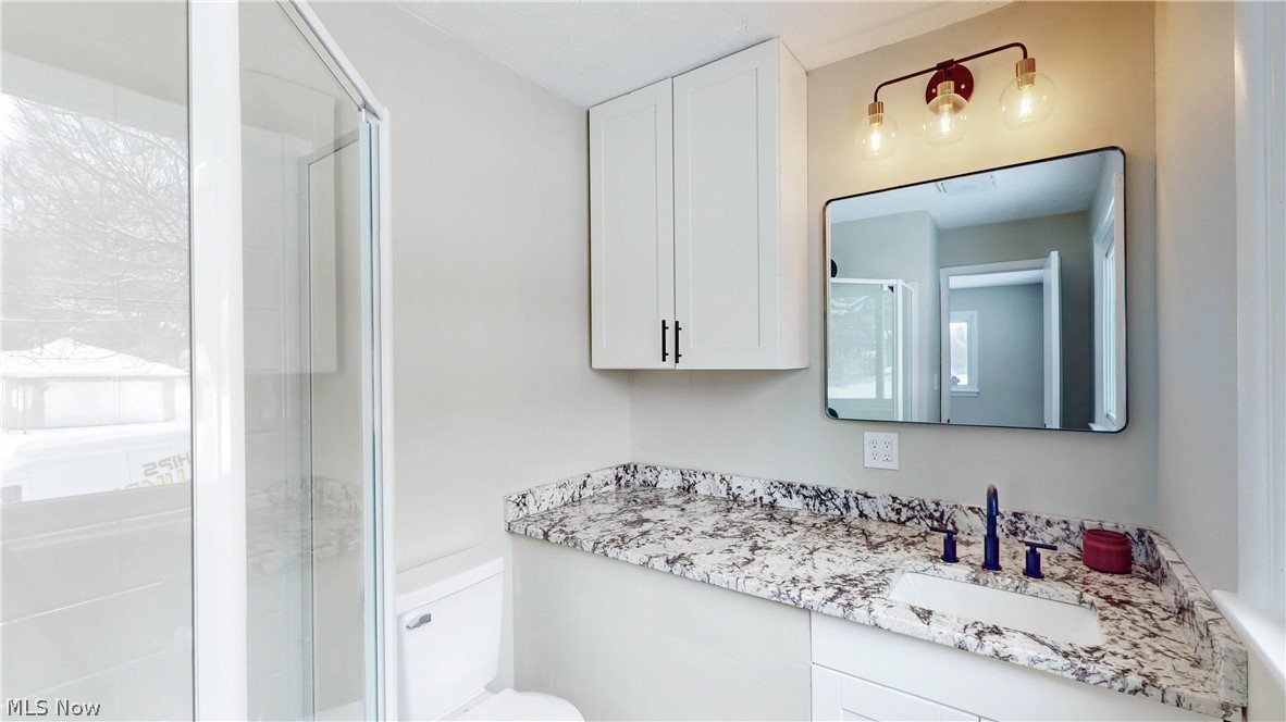 3312 Bancroft Road Akron, OH 44333 - Photo 32 of 50 Full bath featuring vanity and a shower stall