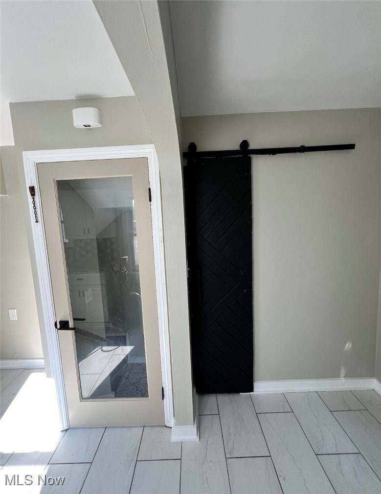 Bathroom featuring baseboards