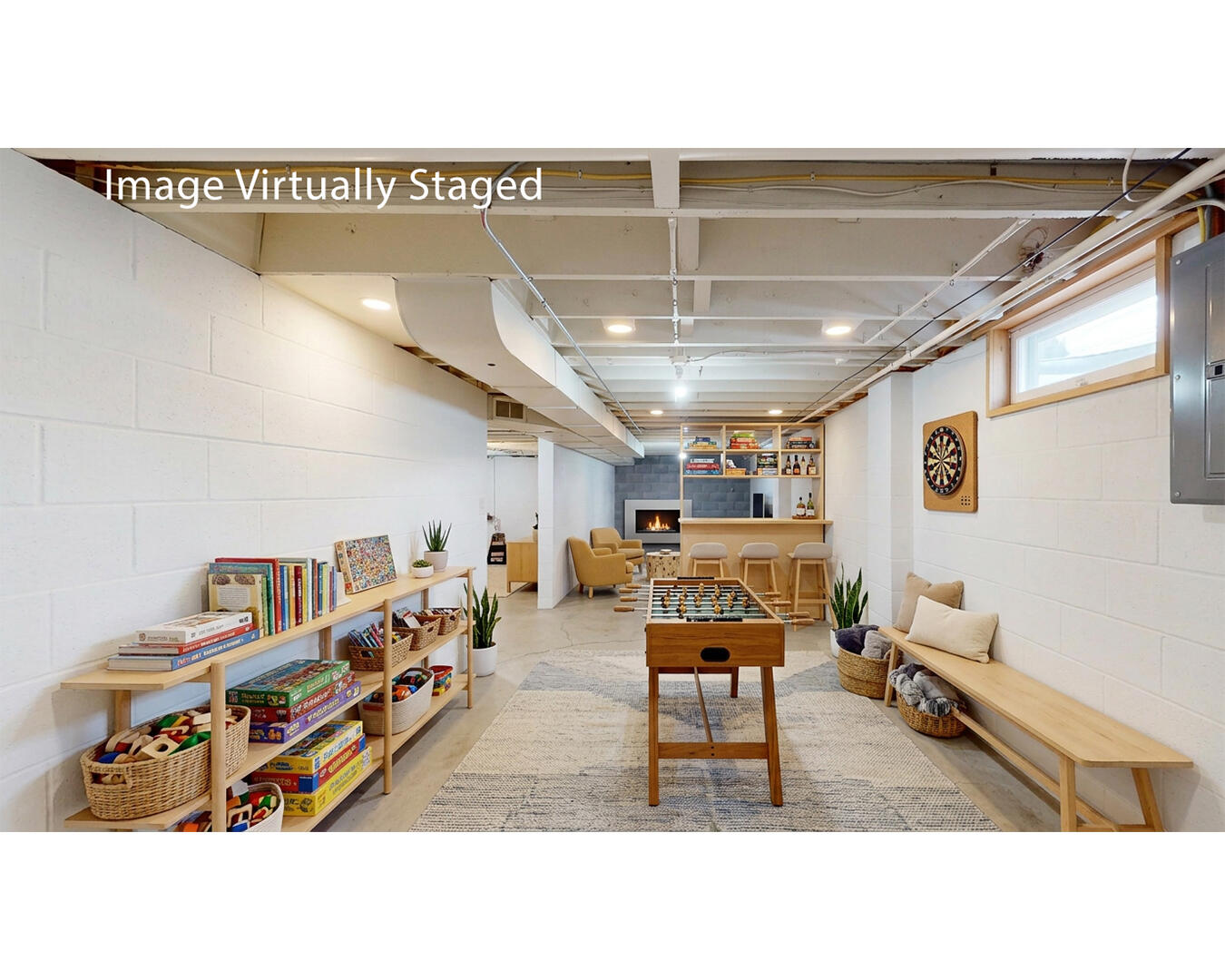 1525 George Street Manitowoc, WI 54220 - Photo 20 of 29 Rec Room virtually staged with electric wall mount fireplace