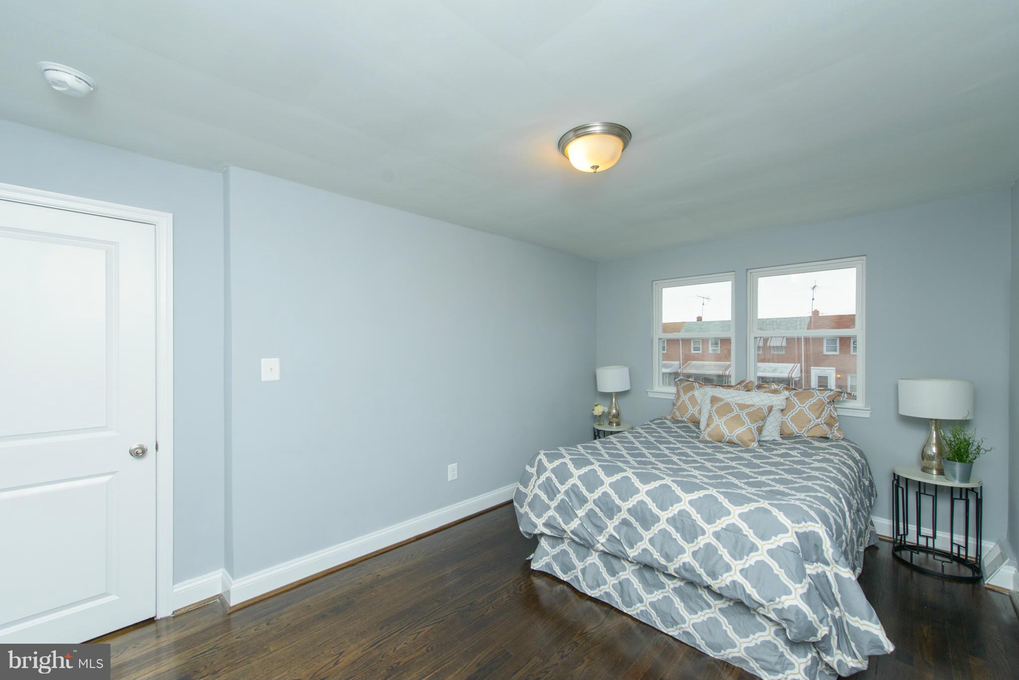 2127 Firethorn Road Baltimore, MD 21220 - Photo 12 of 30 a bedroom with a bed and a window