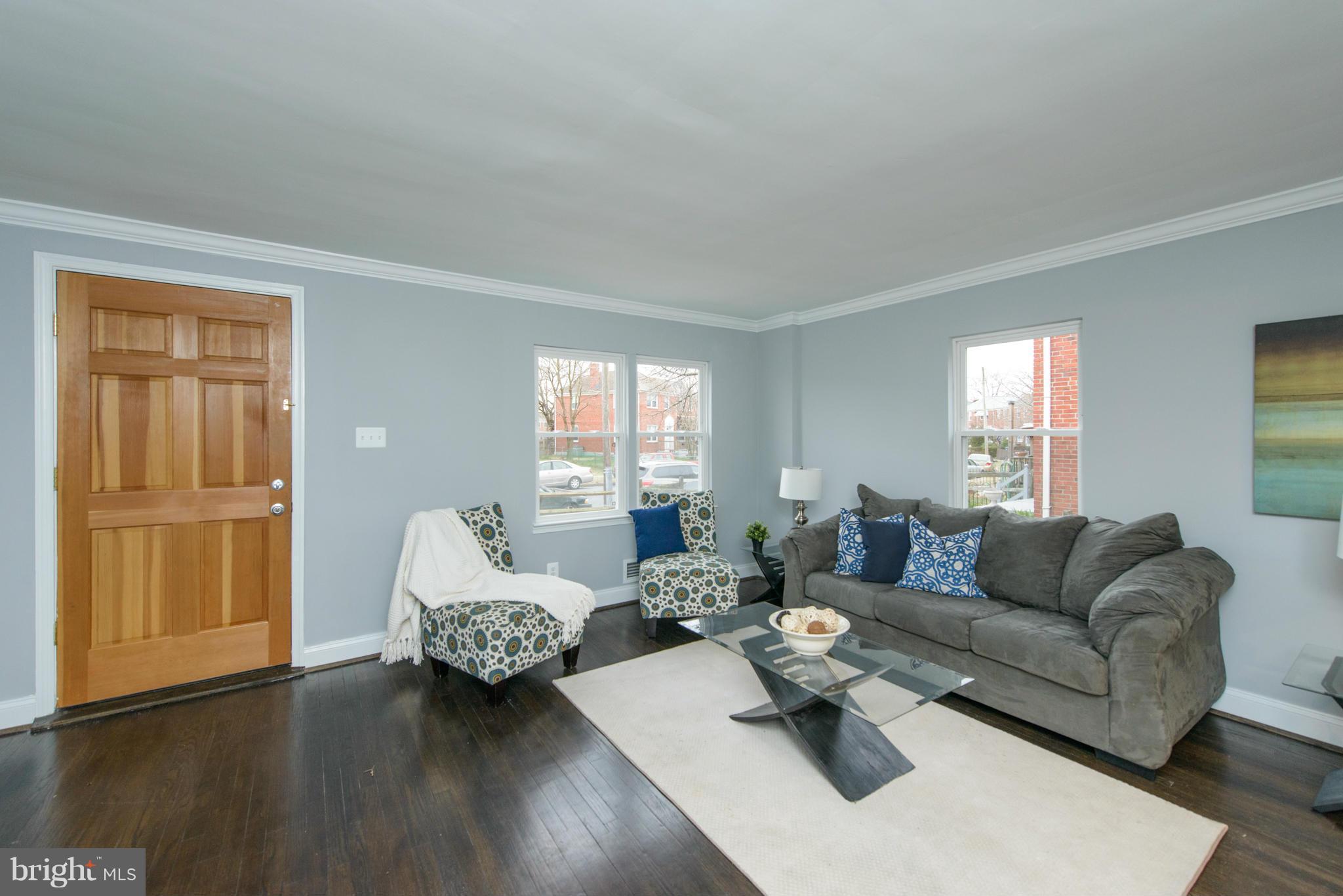 2127 Firethorn Road Baltimore, MD 21220 - Photo 3 of 30 a living room with furniture and a window