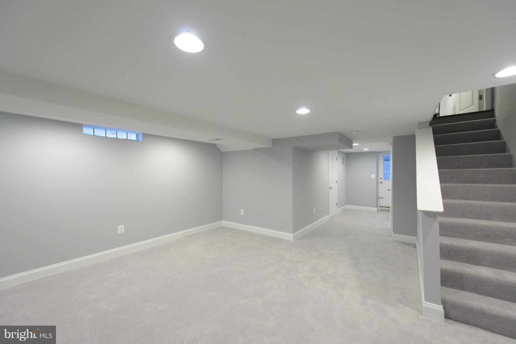 2127 Firethorn Road Baltimore, MD 21220 - Photo 21 of 30 a view of an empty room with stairs