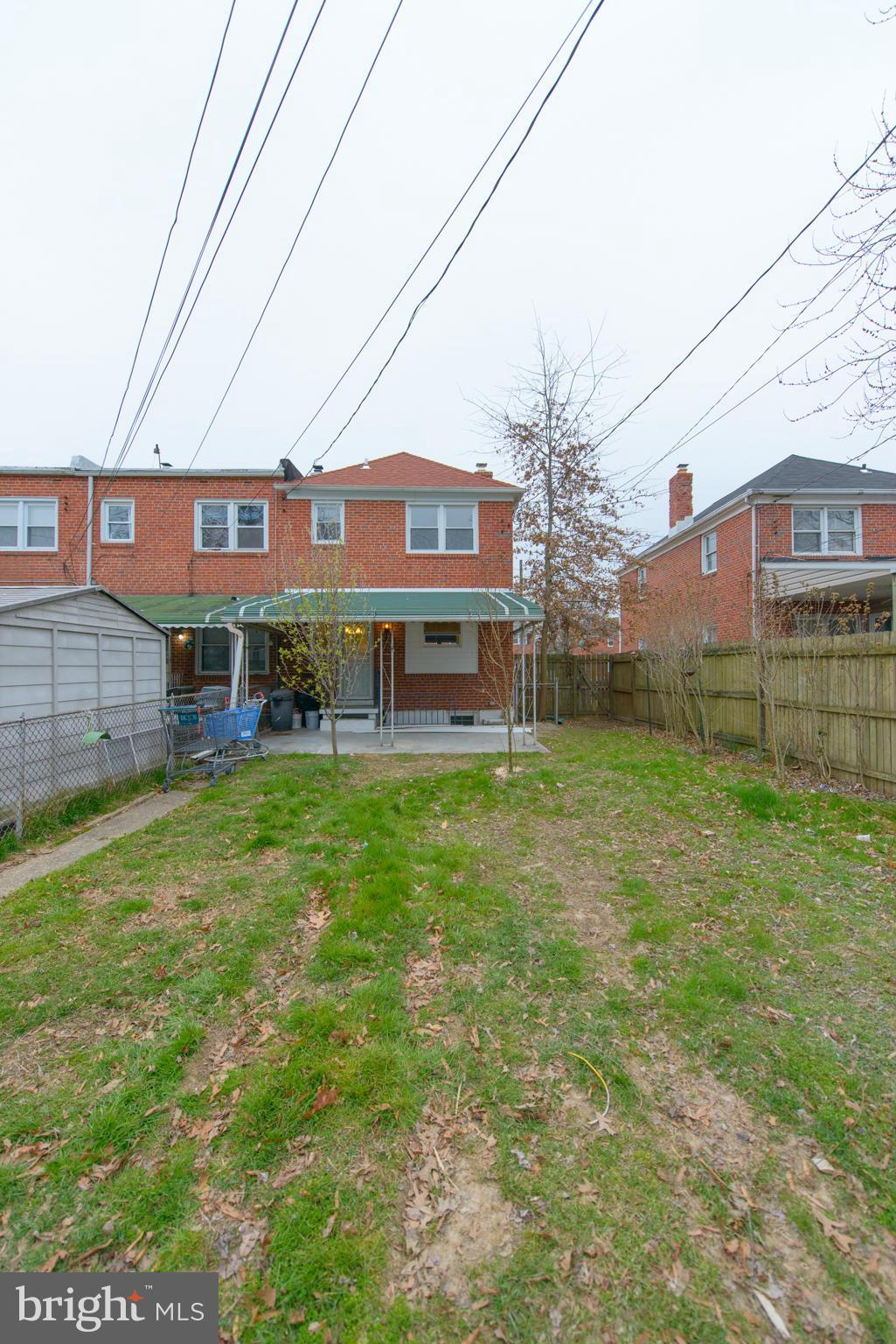 2127 Firethorn Road Baltimore, MD 21220 - Photo 29 of 30 a view of a brick building with many windows