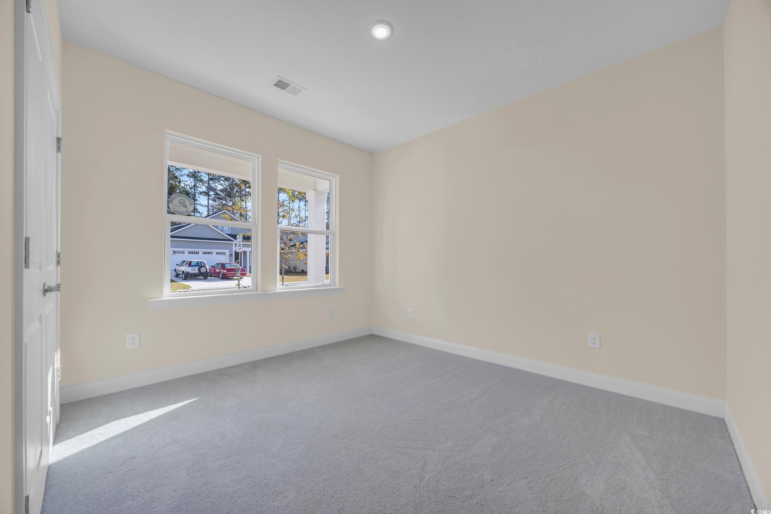 547 Beckham Court Murrells Inlet, SC 29576 - Photo 12 of 40 View of carpeted spare room